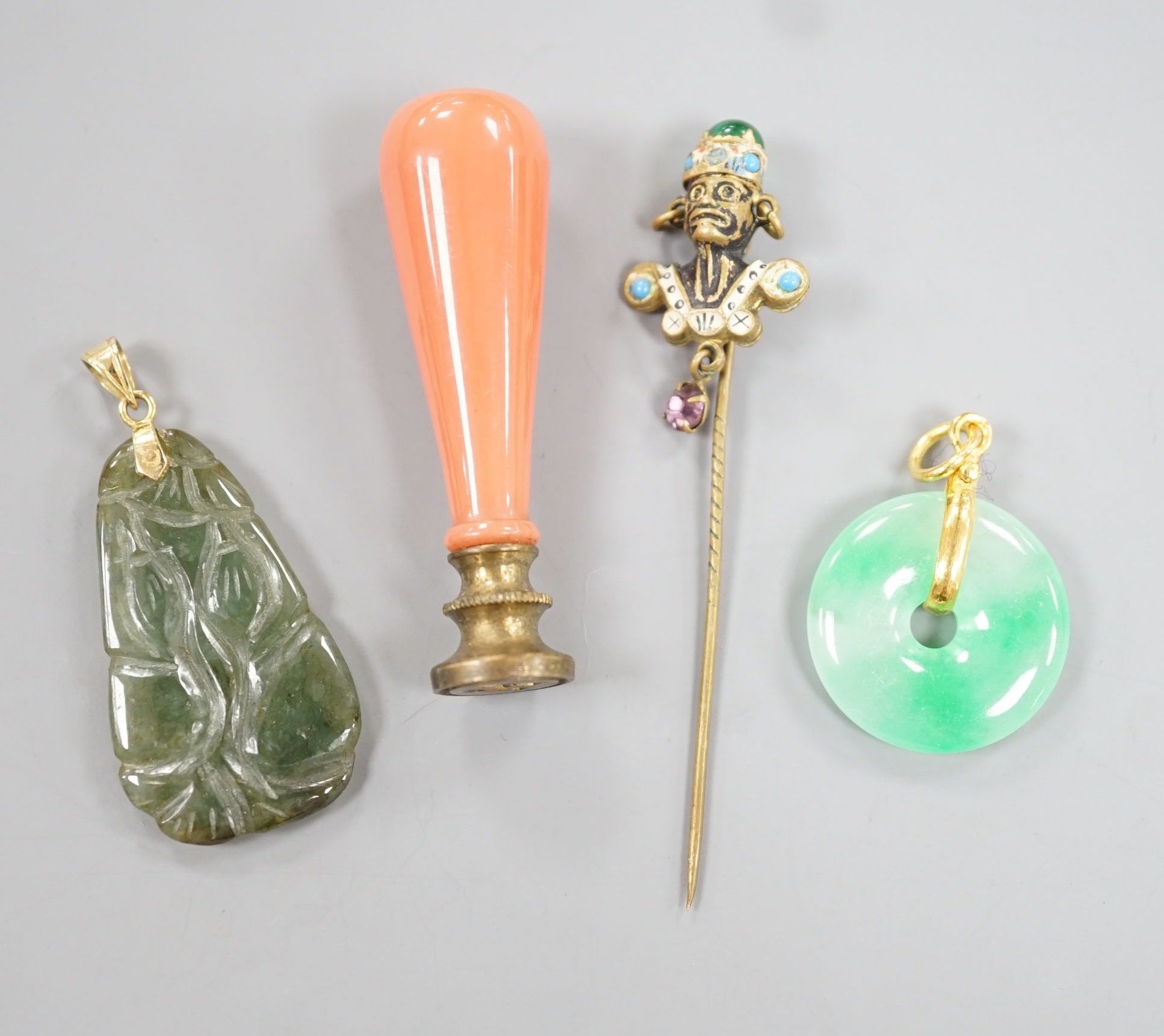 An 18k mounted jade set teardrop shaped pendant, 36mm and three other items of jewellery, including a seal and stick pin.
